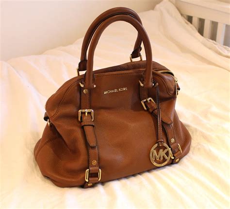 michael kors bags preloved|sell used Michael Kors handbags.